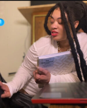 Employee (Implied) Teasing the boss in his leather jacket